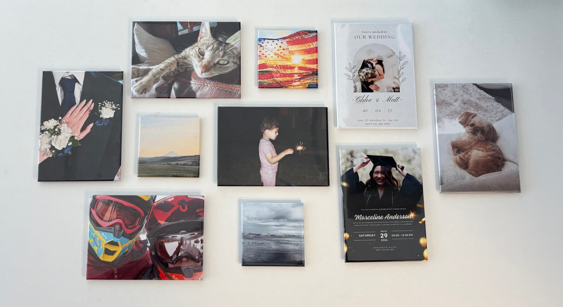 A flat-lay of custom Keepzie photo magnets showing weddings, pets, kids, graduation, sports, and travel memories